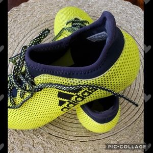 Young kids Brand new Adidas soccer shoes.